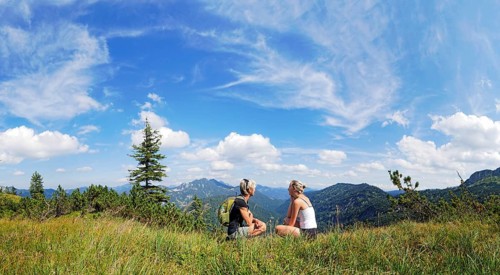 Mother and daughter resting on Weisenbachkopf mountain