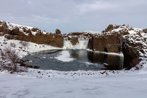 Hjalparfoss waterfall in the highlands