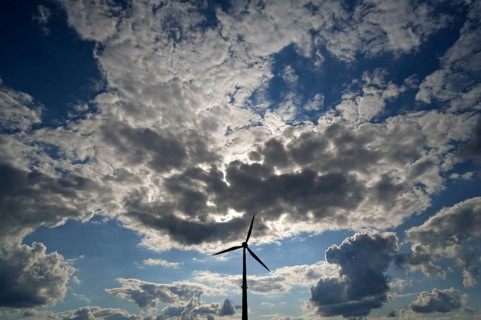 tratocumulus and a wind turbine as a silhouette