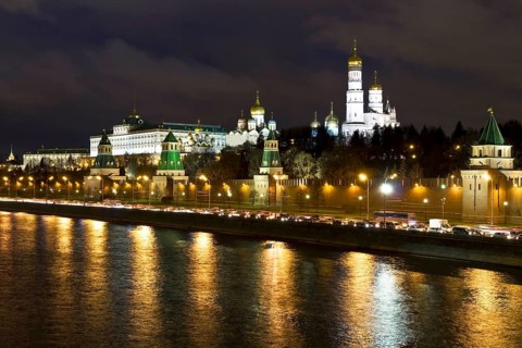 Moscow Kremlin with palace and cathedrals on Moskva River at night