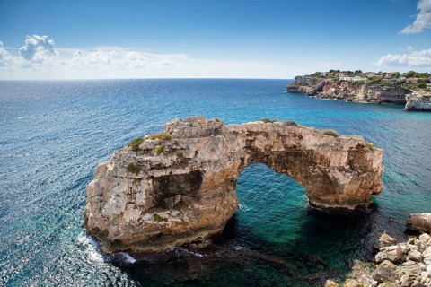 Natural stone arch in the sea