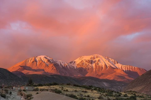 The Taapaca volcano at sunset