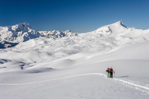 Ski mountaineers during the ascent of Mt Seekofel in the Fanes-Sennes-Prags Nature Park of the Dolomites