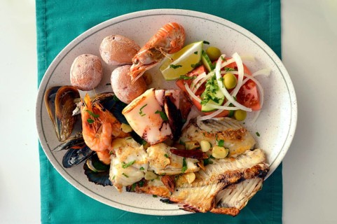 Typical fish dish with shrimps