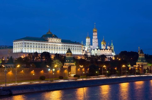 Moscow Kremlin with palace and cathedrals on Moskva River at night