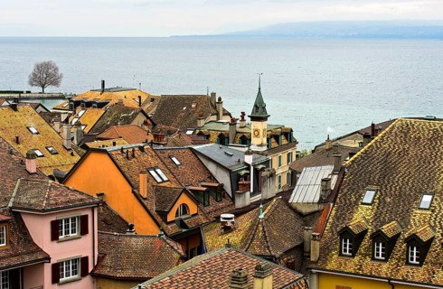 View from the castle over the rooftops of Nyon of Lake Geneva