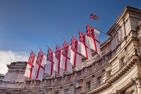 Admiralty Arch flying White Ensigns