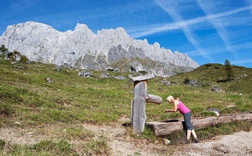 Hiker drinking at a fountain