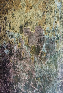 Wall with remnants of plaster and paint