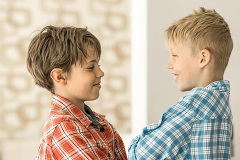 Two boys in plaid shirts