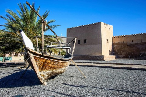 Old dhow in front of Khasab fort