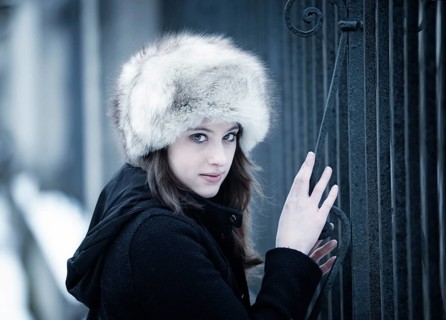 Young woman wearing a fur hat