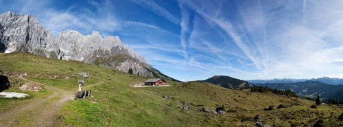 Alpine landscape with mountain mountain hut