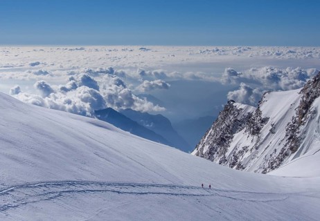 Two climbers above the clouds on Monte Rosa