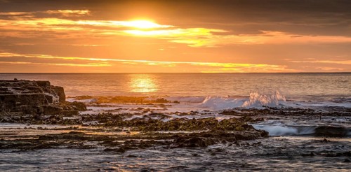 Landscape with sunset on the rocky coast