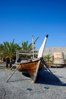 Old dhow in front of Khasab fort