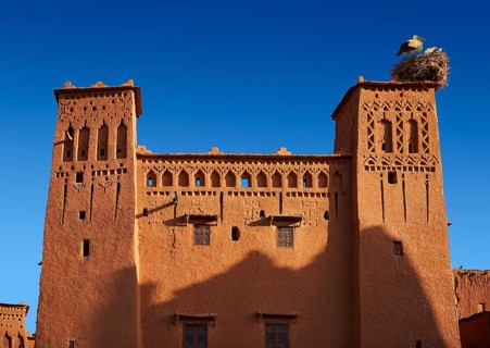Stork's nest on the mud buildings of the fortified Berber Ksar of Ait Benhaddou