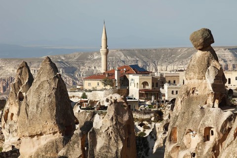 Mosque of Uchisar between cave dwellings and tufa formations
