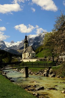 Parish church St. Sebastian in spring with Ramsauer Ache