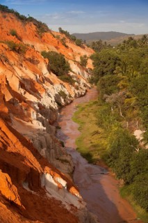 Red sandstone formations of the canyon on Fairy Stream