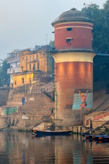 Red water tower on the Ganges riverbank