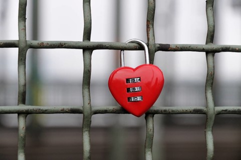 Red padlock in heart shape