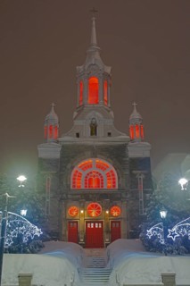Illuminated church Paroisse Saint-Sauveur in winter