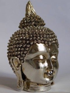 Silver head of a Buddha with eyes closed