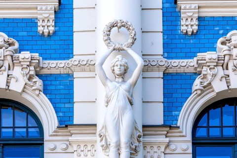 Sculpture on the facade of building No. 4 Strelnieku iela street