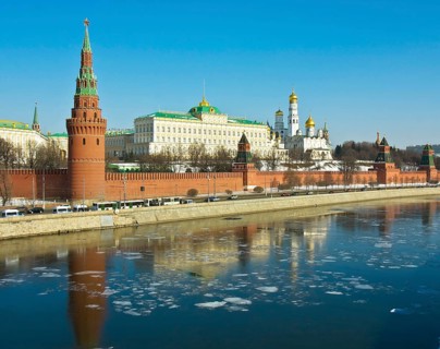 Moscow Kremlin with palace and cathedrals on bank of Moskva River in spring