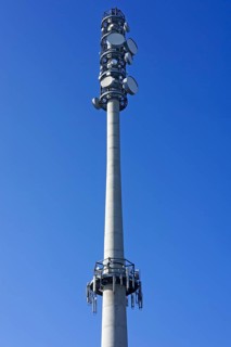 Transmission tower against a blue sky