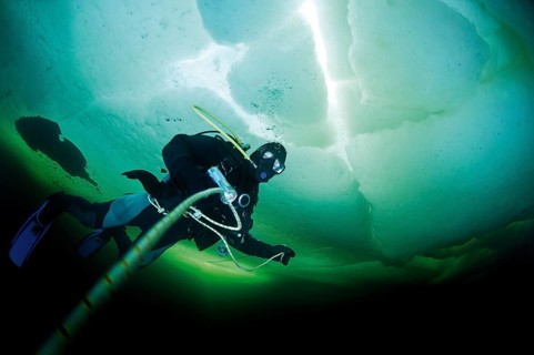 Diver under ice