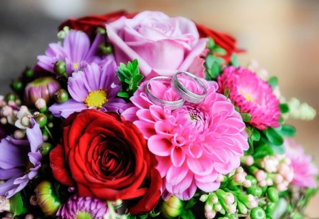 Wedding rings on wedding bouquet
