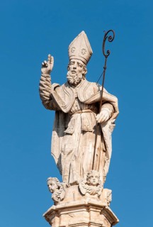 Baroque statue on top of the column of Saint Oronzo