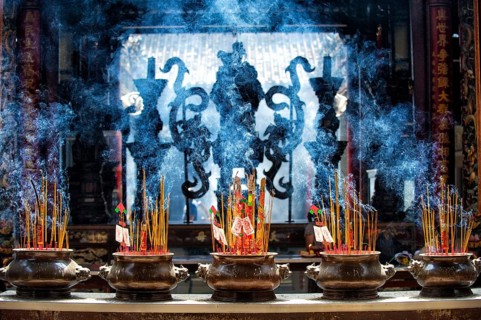Incense sticks and incense coils in a temple