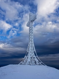 Summit cross covered with hoarfrost