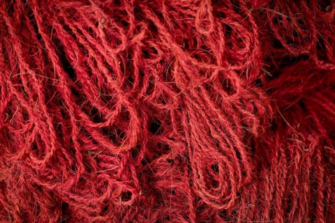 Red coloured ropes made of coconut fibres or coir