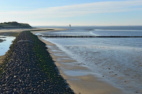 Coastal protection wall made of stones on the western beach