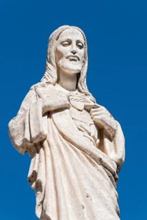 White Statue of Jesus Christ outside the Chapel of Virgen de la Pena