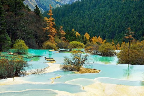 Lime terraces with lakes in autumnal environment