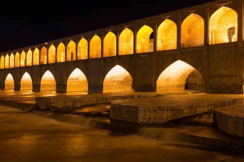 Illuminated Si-o-se Pol Bridge or Allah-Verdi Khan Bridge at night