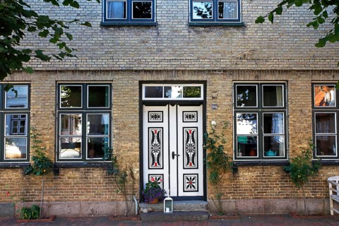 Historical house with decorative wooden door