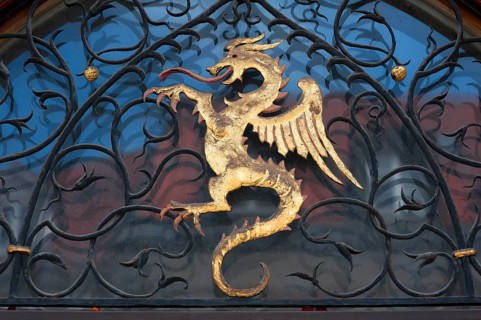 Dragon figure over the entrance of the town hall