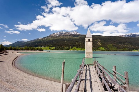 Steeple of Alt-Graun in Lake Reschensee in Alta Val Venosta