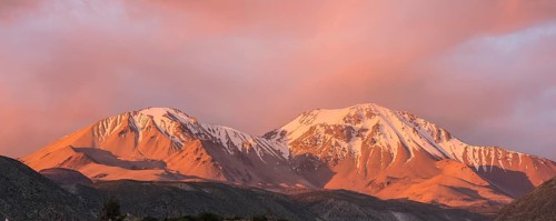 The Taapaca volcano at sunset
