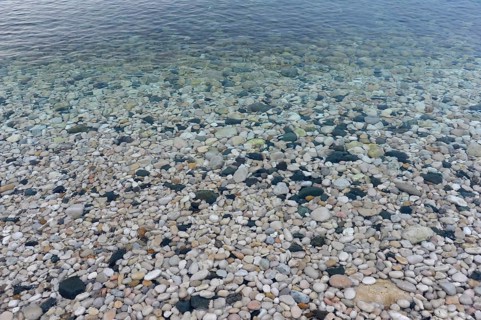 Pebbles on the beach of La Olla in Altea