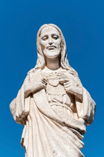 White statue of Jesus Christ outside the Chapel of Virgen de la Pena