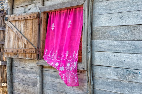 Typical house with pink curtain