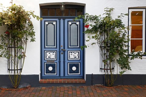Historical house with decorative wooden door