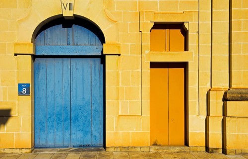 Gate and door of a restored historic warehouse building
